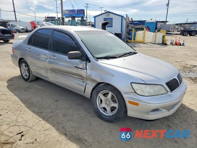 Czwarte zdjęcie samochodu z boku: 2002 MITSUBISHI LANCER ES VIN:JA3AJ26E82U083932 - miniatura