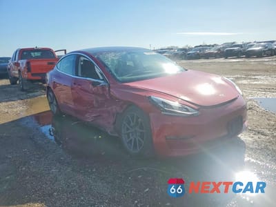 Czwarte zdjęcie samochodu z boku: 2020 TESLA MODEL 3 VIN:5YJ3E1EB4LF600329 - miniatura