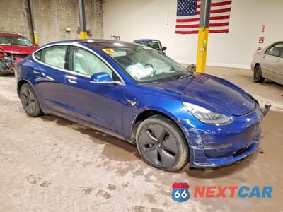 Czwarte zdjęcie samochodu z boku: 2018 TESLA MODEL 3 VIN:5YJ3E1EA6JF019578 - miniatura