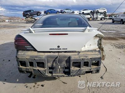Zdjęcie 6 z 13 samochodu: 1999 PONTIAC GRAND AM SE VIN:1G2NE52E2XC508402 - miniatura