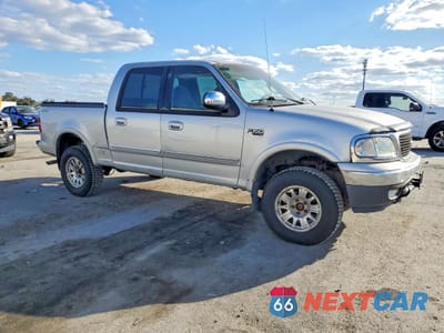 Czwarte zdjęcie samochodu z boku: 2001 FORD F150 SUPERCREW VIN:1FTRW08W31KE95251 - miniatura