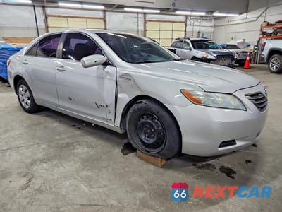 Czwarte zdjęcie samochodu z boku: 2009 TOYOTA CAMRY HYBRID BASE VIN:4T1BB46K89U111061 - miniatura