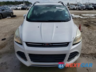Piąte zdjęcie samochodu w środku: 2016 FORD ESCAPE SE VIN:1FMCU0G91GUC77809 - miniatura