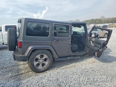 Trzecie zdjęcie samochodu z tyłu: 2016 JEEP WRANGLER UNLIMITED SAHARA VIN:1C4BJWEG5GL164707 - miniatura