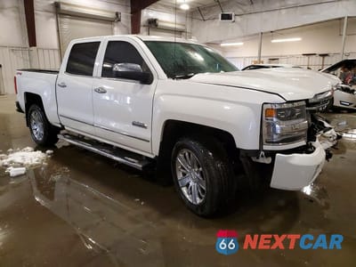Czwarte zdjęcie samochodu z boku: 2016 CHEVROLET SILVERADO K1500 HIGH COUNTRY VIN:3GCUKTEC5GG230316 - miniatura