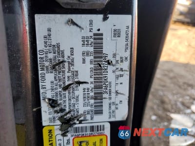 Zdjęcie 12 z 12 samochodu: 2013 FORD FUSION TITANIUM VIN:3FA6P0K91DR274997 - miniatura