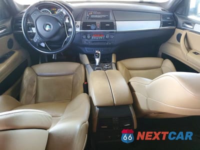 Zdjęcie 8 z 11 samochodu: 2011 BMW X6 M VIN:5YMGZ0C50BLK13891 - miniatura