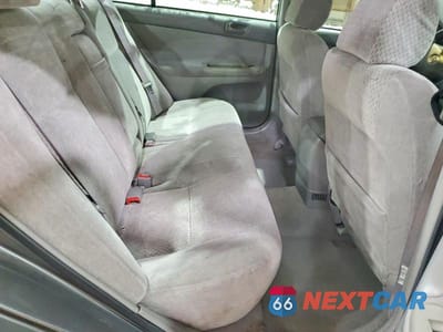 Zdjęcie 10 z 11 samochodu: 2003 TOYOTA CAMRY LE VIN:4T1BF32K53U548219 - miniatura