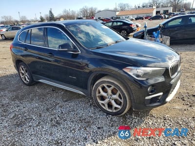 Czwarte zdjęcie samochodu z boku: 2018 BMW X1 XDRIVE28I VIN:WBXHT3Z39J4A65924 - miniatura