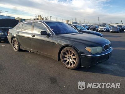Czwarte zdjęcie samochodu z boku: 2004 BMW 745 LI VIN:WBAGN63584DS51886 - miniatura