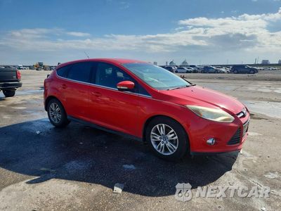 Czwarte zdjęcie samochodu z boku: 2012 FORD FOCUS SEL VIN:1FAHP3M27CL208252 - miniatura