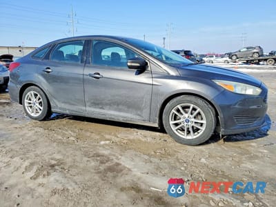 Czwarte zdjęcie samochodu z boku: 2015 FORD FOCUS SE VIN:1FADP3F23FL346998 - miniatura