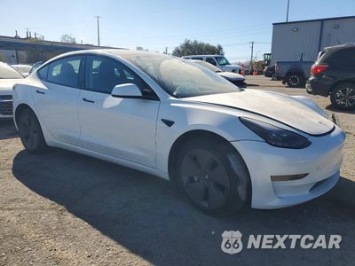 Czwarte zdjęcie samochodu z boku: 2023 TESLA MODEL 3 VIN:5YJ3E1EA2PF490782 - miniatura