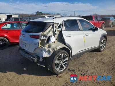 Trzecie zdjęcie samochodu z tyłu: 2020 HYUNDAI KONA LIMITED VIN:KM8K3CA56LU590869 - miniatura