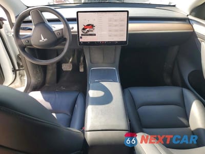 Zdjęcie 8 z 12 samochodu: 2023 TESLA MODEL Y VIN:7SAYGDEE0PF612059 - miniatura