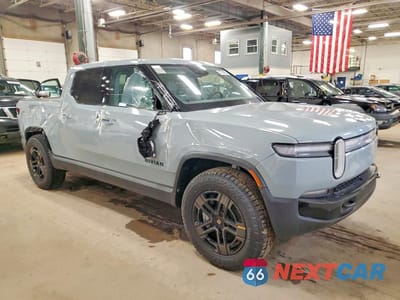 Czwarte zdjęcie samochodu z boku: 2025 RIVIAN R1T ADVENTURE VIN:7FCTGBAAXSN040324 - miniatura