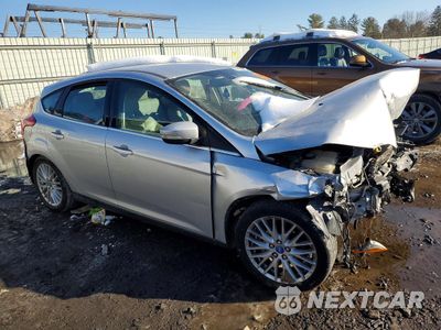 Czwarte zdjęcie samochodu z boku: 2012 FORD FOCUS SEL VIN:1FAHP3M23CL200097 - miniatura