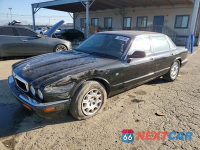1999 JAGUAR XJ8 SAJHD1040XC869269 - główne zdjęcie licytacji z USA - miniatura