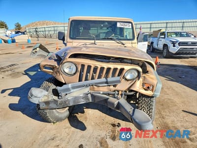 Piąte zdjęcie samochodu w środku: 1999 JEEP WRANGLER / TJ SPORT VIN:1J4FY19S0XP407289 - miniatura
