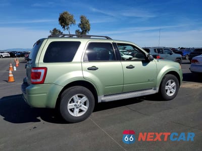 Trzecie zdjęcie samochodu z tyłu: 2010 FORD ESCAPE HYBRID VIN:1FMCU4K39AKB91788 - miniatura