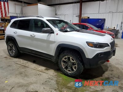Czwarte zdjęcie samochodu z boku: 2019 JEEP CHEROKEE TRAILHAWK VIN:1C4PJMBN3KD400819 - miniatura