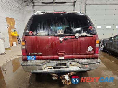 Zdjęcie 6 z 13 samochodu: 2002 GMC YUKON VIN:1GKEK13T72J161202 - miniatura
