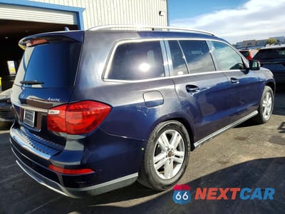 Trzecie zdjęcie samochodu z tyłu: 2013 MERCEDES-BENZ GL 450 4MATIC VIN:4JGDF7CE0DA165168 - miniatura