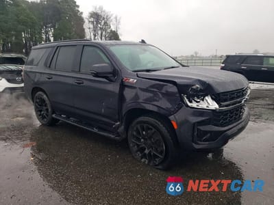 Czwarte zdjęcie samochodu z boku: 2022 CHEVROLET TAHOE K1500 Z71 VIN:1GNSKPKD6NR289536 - miniatura