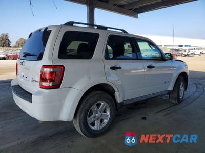 Trzecie zdjęcie samochodu z tyłu: 2012 FORD ESCAPE HYBRID VIN:1FMCU5K38CKB22132 - miniatura