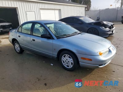 Czwarte zdjęcie samochodu z boku: 2002 SATURN SL SPRING SPECIAL VIN:1G8ZS52882Z291535 - miniatura