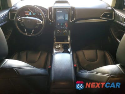 Zdjęcie 8 z 12 samochodu: 2022 FORD EDGE TITANIUM VIN:2FMPK4K98NBA94528 - miniatura