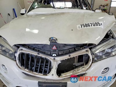 Zdjęcie 11 z 12 samochodu: 2016 BMW X5 SDRIVE35I VIN:5UXKR2C55G0H43153 - miniatura