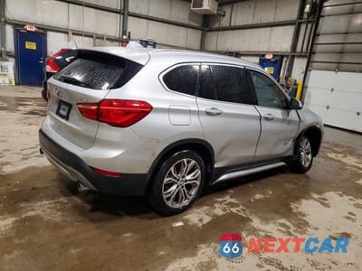 Trzecie zdjęcie samochodu z tyłu: 2018 BMW X1 XDRIVE28I VIN:WBXHT3C37J5F89785 - miniatura