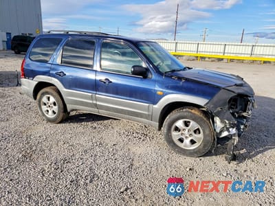 Czwarte zdjęcie samochodu z boku: 2002 MAZDA TRIBUTE LX VIN:4F2YU081X2KM33871 - miniatura