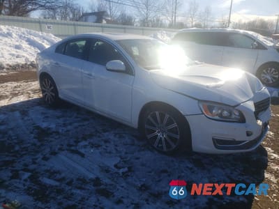 Czwarte zdjęcie samochodu z boku: 2015 VOLVO S60 PREMIER VIN:YV140MFB8F1317927 - miniatura