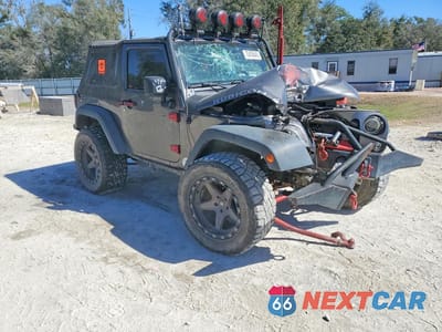 Czwarte zdjęcie samochodu z boku: 2014 JEEP WRANGLER RUBICON VIN:1C4BJWCG3EL219736 - miniatura