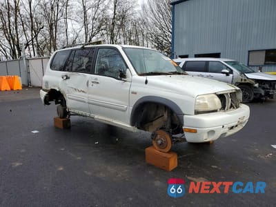Czwarte zdjęcie samochodu z boku: 2002 SUZUKI XL7 PLUS VIN:JS3TX92V024120139 - miniatura