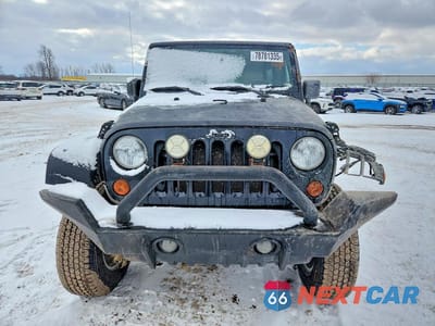 Piąte zdjęcie samochodu w środku: 2008 JEEP WRANGLER UNLIMITED SAHARA VIN:1J4GA59148L637126 - miniatura
