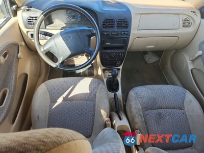 Zdjęcie 8 z 11 samochodu: 2001 KIA RIO VIN:KNADC123716015855 - miniatura