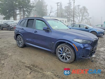 Czwarte zdjęcie samochodu z boku: 2026 BMW X5 XDRIVE40I VIN:5UX23EU00T9187715 - miniatura