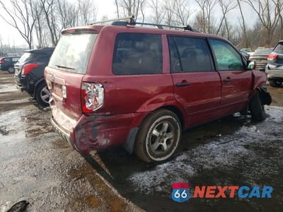 Trzecie zdjęcie samochodu z tyłu: 2003 HONDA PILOT EX VIN:2HKYF18463H592056 - miniatura