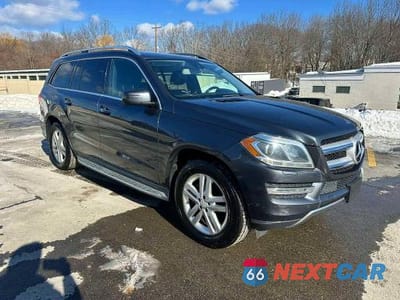 Czwarte zdjęcie samochodu z boku: 2015 MERCEDES-BENZ GL 350 BLUETEC VIN:4JGDF2EE9FA549503 - miniatura