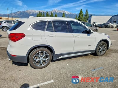 Trzecie zdjęcie samochodu z tyłu: 2018 BMW X1 SDRIVE28I VIN:WBXHU7C31J5H39104 - miniatura