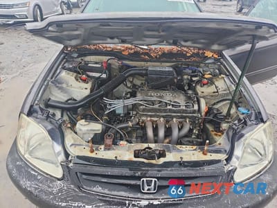 Zdjęcie 11 z 12 samochodu: 1999 HONDA CIVIC CX VIN:2HGEJ6323XH110387 - miniatura