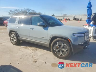 Czwarte zdjęcie samochodu z boku: 2024 RIVIAN R1S ADVENTURE VIN:7PDSGABA8RN039136 - miniatura