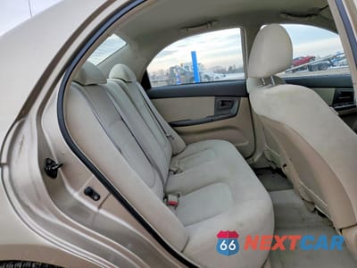 Zdjęcie 10 z 13 samochodu: 2004 KIA SPECTRA LX VIN:KNAFE121345058584 - miniatura