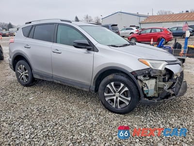 Czwarte zdjęcie samochodu z boku: 2017 TOYOTA RAV4 LE AWD VIN:2T3BFREV9HW665325 - miniatura