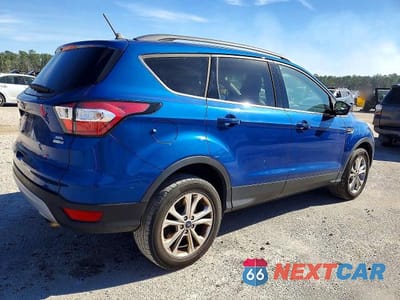 Trzecie zdjęcie samochodu z tyłu: 2018 FORD ESCAPE SEL VIN:1FMCU9HD6JUA57869 - miniatura