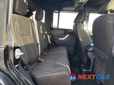 Zdjęcie 11 z 12 samochodu: 2015 JEEP WRANGLER UNLIMITED SAHARA VIN:1C4BJWEG5FL734770 - miniatura