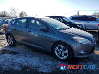Czwarte zdjęcie samochodu z boku: 2012 FORD FOCUS SE VIN:1FAHP3K29CL442072 - miniatura
